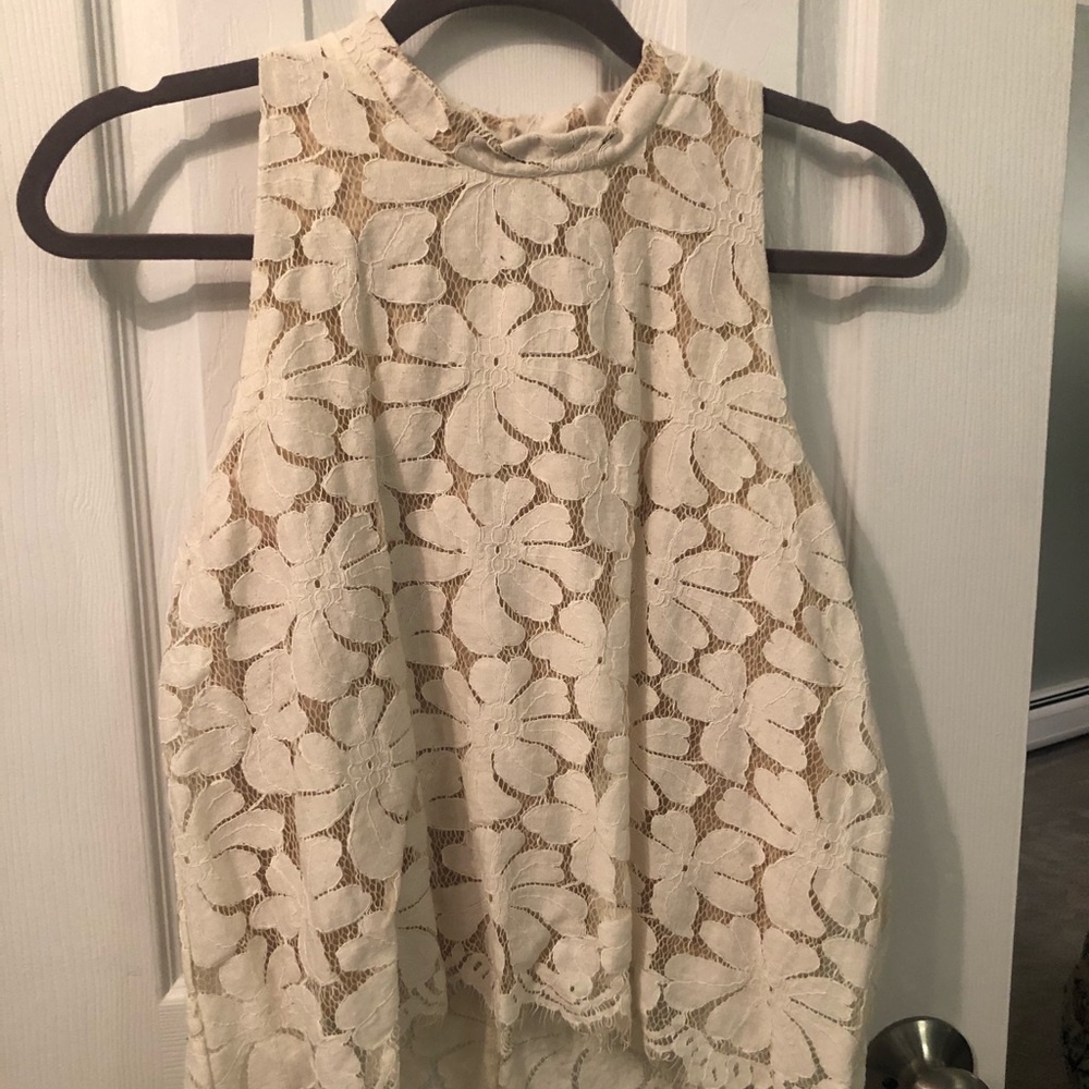 Boutique high neck sleeveless blouse